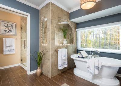 Coastal bathroom design with soaking tub